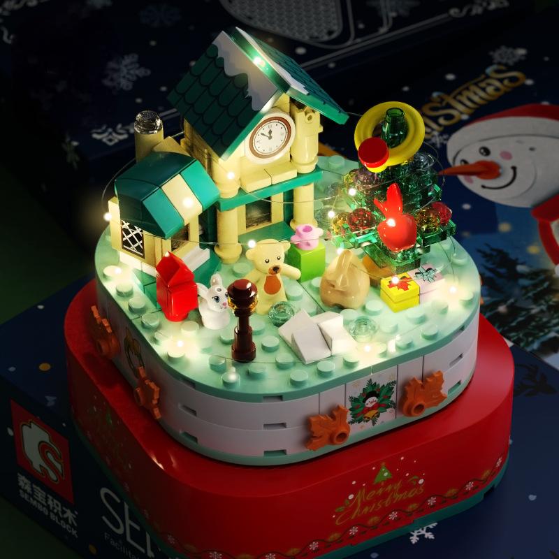 christmas-gift-snowman-rotating-music-box-diy-music-light-house-assembly-building-blocks-toy-gift