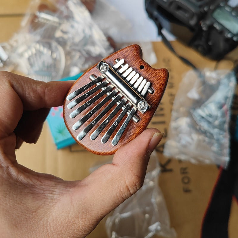 mini-thumb-piano-8-note-mini-kalimba-crystal-clear-five-finger-piano-portable-beginner-finger-piano-musical-instrument